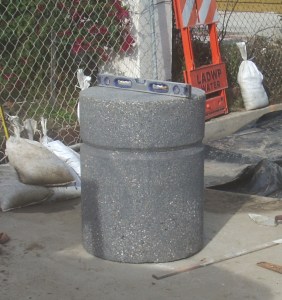 Making sure the bollard is level.